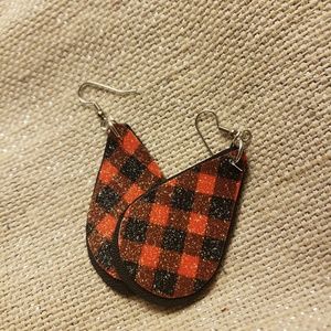 Beautiful black leather, sparkly buffalo plaid